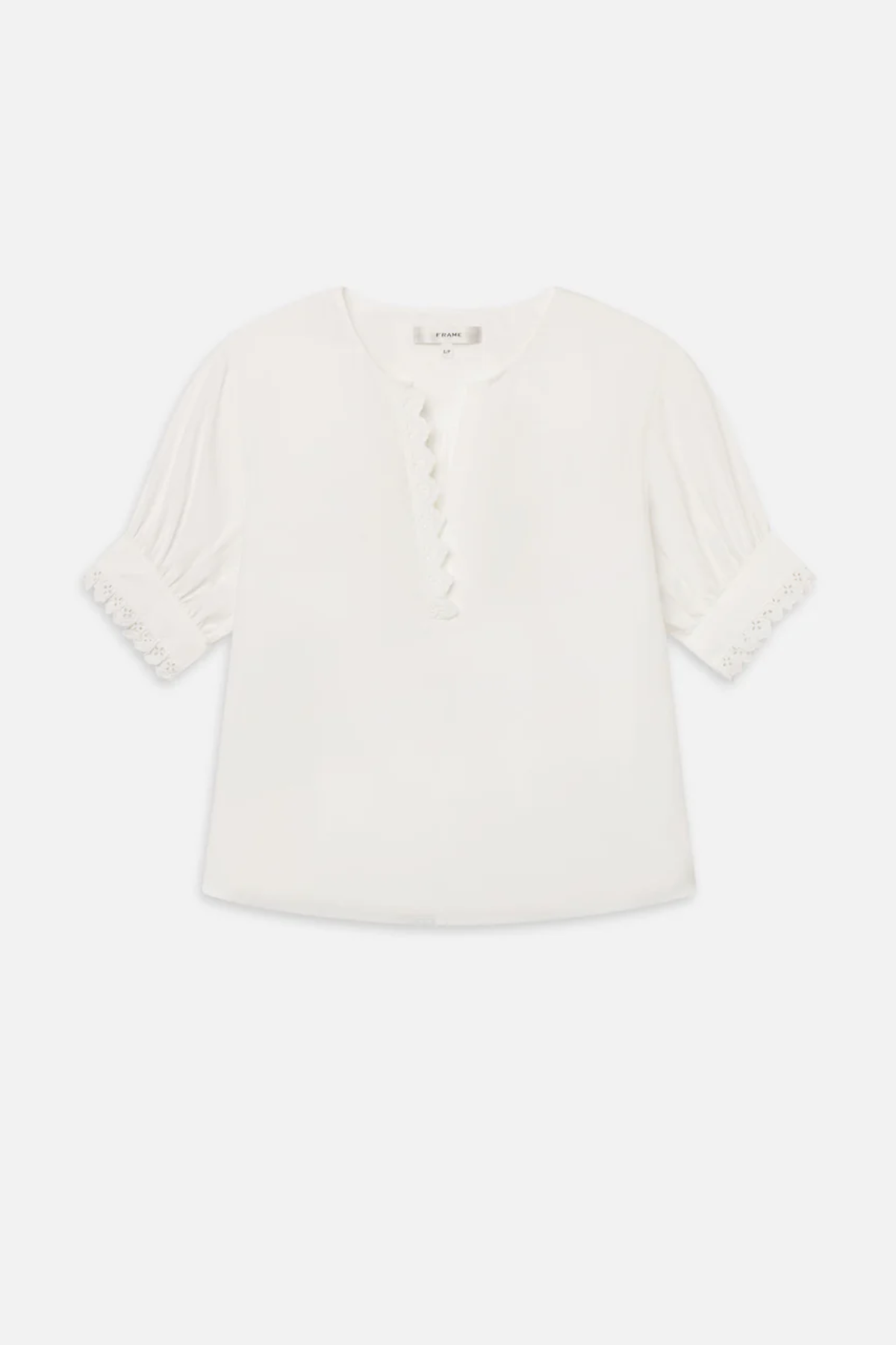 Ivory popover blouse with a relaxed fit and clean minimalist styling.