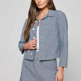 Cropped structured jacket in a blue tone.