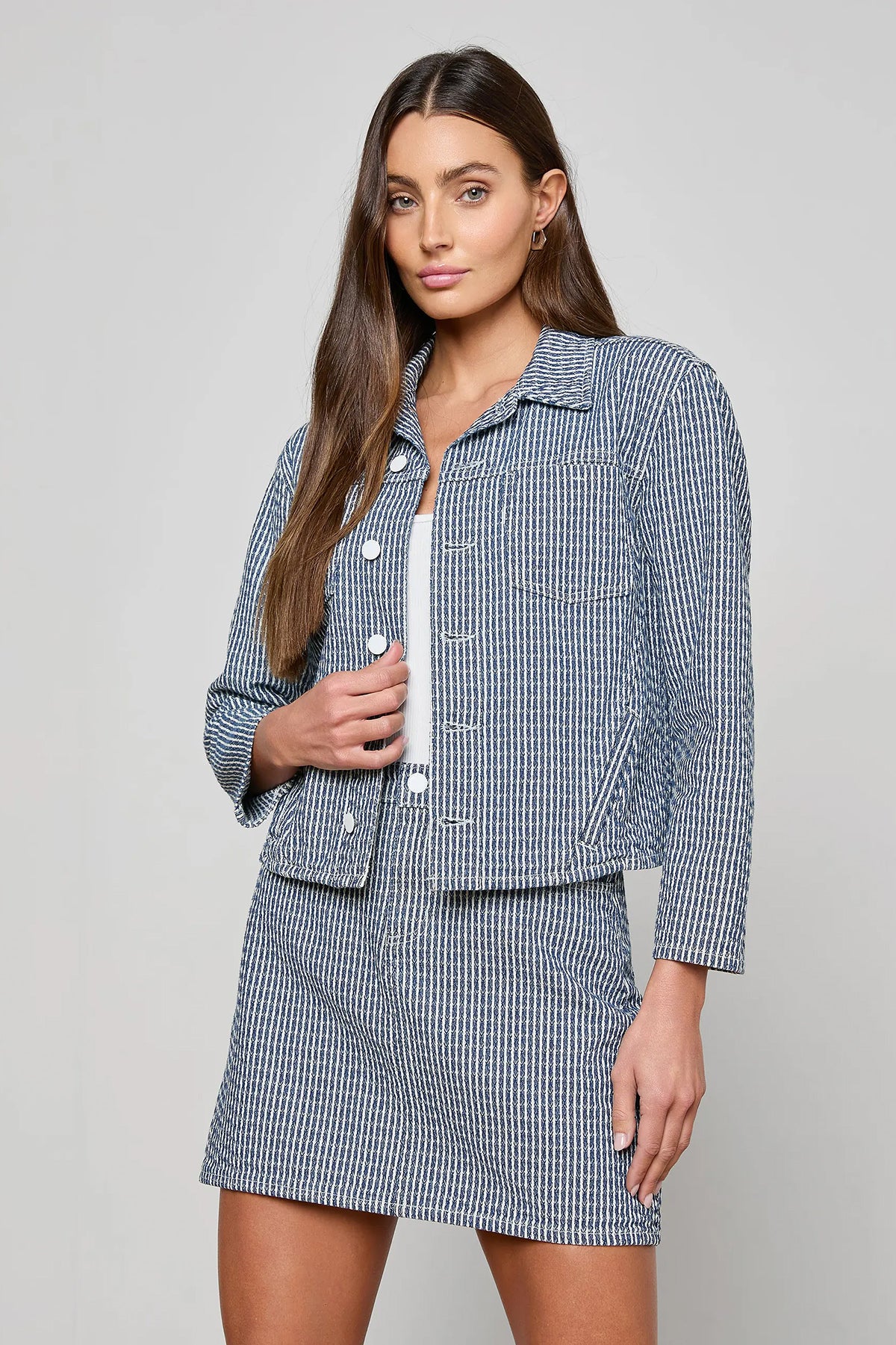 Cropped structured jacket in a blue tone.