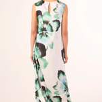 back of woman in floral printed dress on white background 