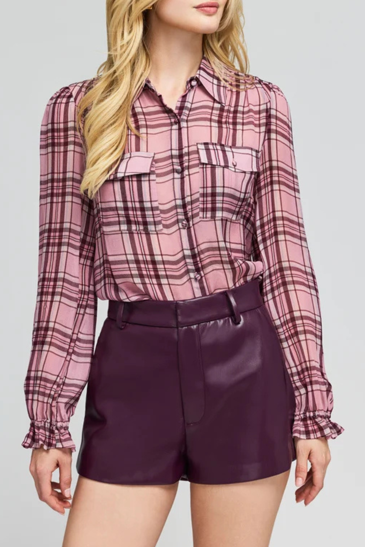 Women's plaid blouse featuring long sleeves, a relaxed silhouette, and multicolor pattern.