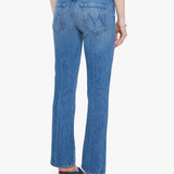 Woman wearing mid-wash cropped flare jeans with a slim upper fit and subtle kick-flare hem.
