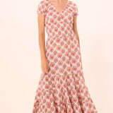 Printed midi dress with a flowing silhouette, styled for everyday wear.