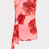 Floral sleeveless top with red roses on a light pink background