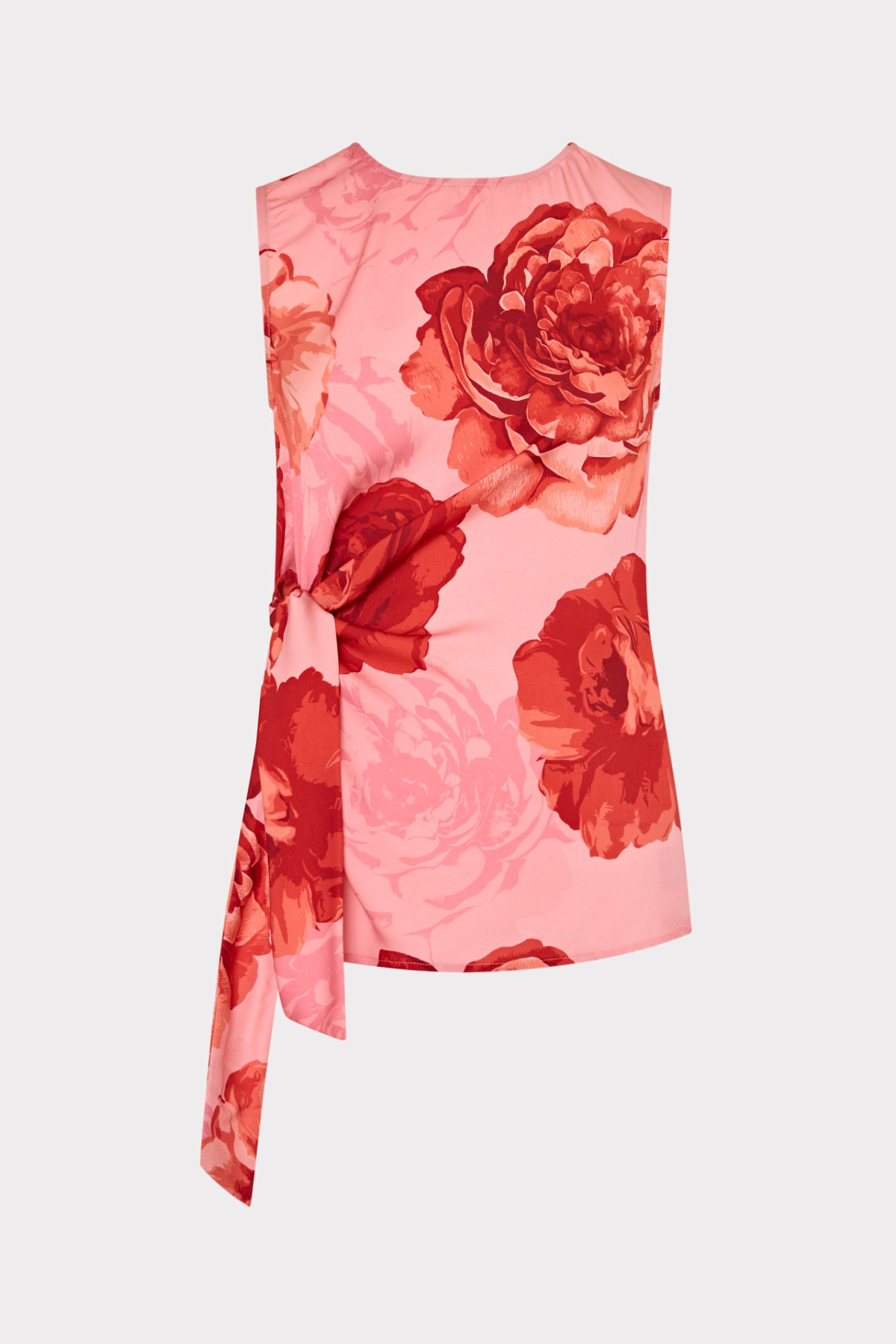 Floral sleeveless top with red roses on a light pink background