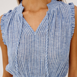 Blue and white striped dress with ruffled shoulders on a plain background