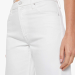 close up of woman in white denim 