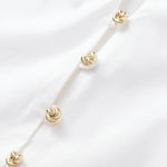 Blouse with dramatic voluminous sleeves styled with denim