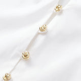 Blouse with dramatic voluminous sleeves styled with denim