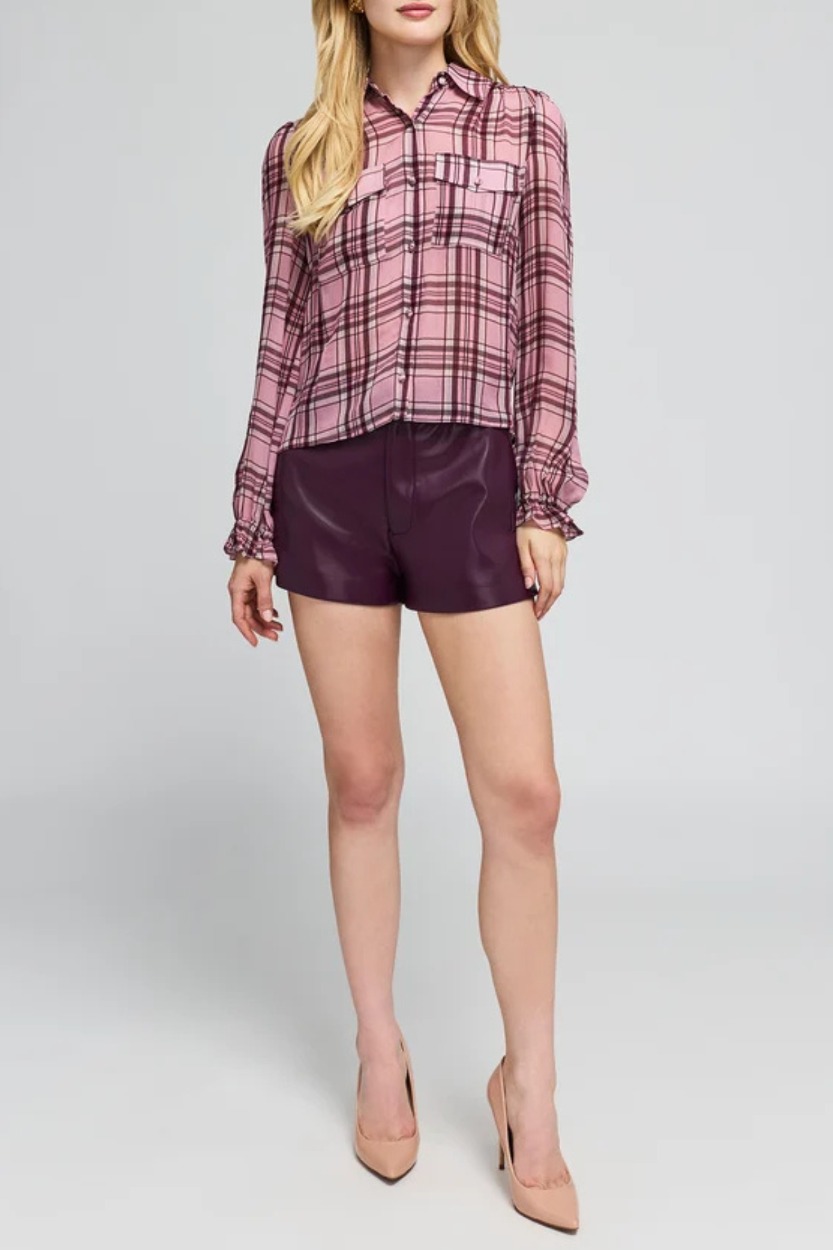 Women's plaid blouse featuring long sleeves, a relaxed silhouette, and multicolor pattern.