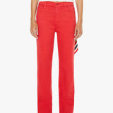 Person wearing bright red pants with a white top on a white background