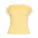 Yellow top with feather details on a white background