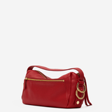 Medium-sized structured leather handbag in a rich red hue featuring a top handle and detachable shoulder strap.