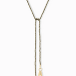 Necklace with gold pendants on a white background