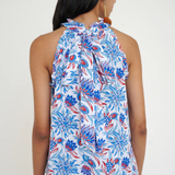 blue and red printed halter top modeled on white background