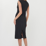 Woman wearing a black sleeveless dress on a white background