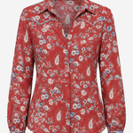 A red long-sleeve western-style button-up shirt with a paisley and floral print, featuring contrast stitching along the collar and shoulders, shown against a plain light gray background.