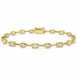 A yellow gold tennis bracelet featuring alternating rectangular baguette and oval-cut clear gemstones, displayed on a clean white background.