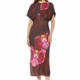 woman in large floral printed midi dress on white background 
