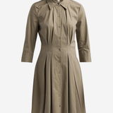 A taupe brown long-sleeve shirt dress with a button-down front, pointed collar, and pleated skirt, shown on a plain light gray background.