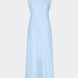 A light blue sleeveless maxi dress with a round neckline and delicate bow details at the back of the neck, shown against a solid light gray background.