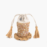 Decorative bag with tassels and a textured top on a white background