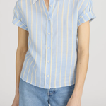 woman in striped button down short sleeve top on white background 