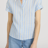 woman in striped button down short sleeve top on white background 