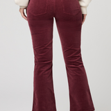 Women's pinot cropped bootcut jeans featuring a rich burgundy hue and flattering silhouette.