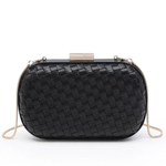 Black woven leather clutch bag with a gold-tone metal clasp and a thin gold shoulder strap, shown against a plain white background.