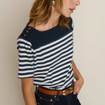 Striped short-sleeve tee with a relaxed fit, styled with denim
