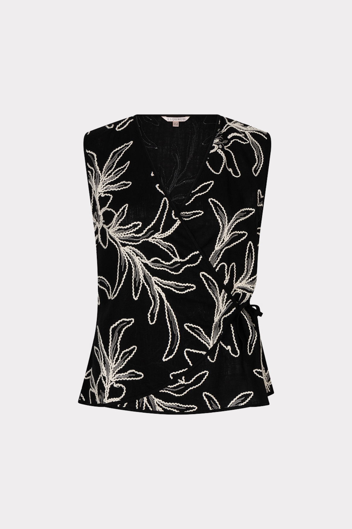 Black sleeveless top with white floral pattern on a white background