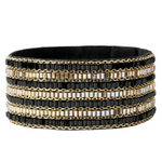 A wide black beaded wrap bracelet with alternating rows of gold chain and rows of black beads accented with iridescent rectangular crystals, shown on a plain white background.