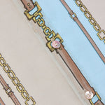 Three-quarter sleeve blouse with a soft stripe pattern.