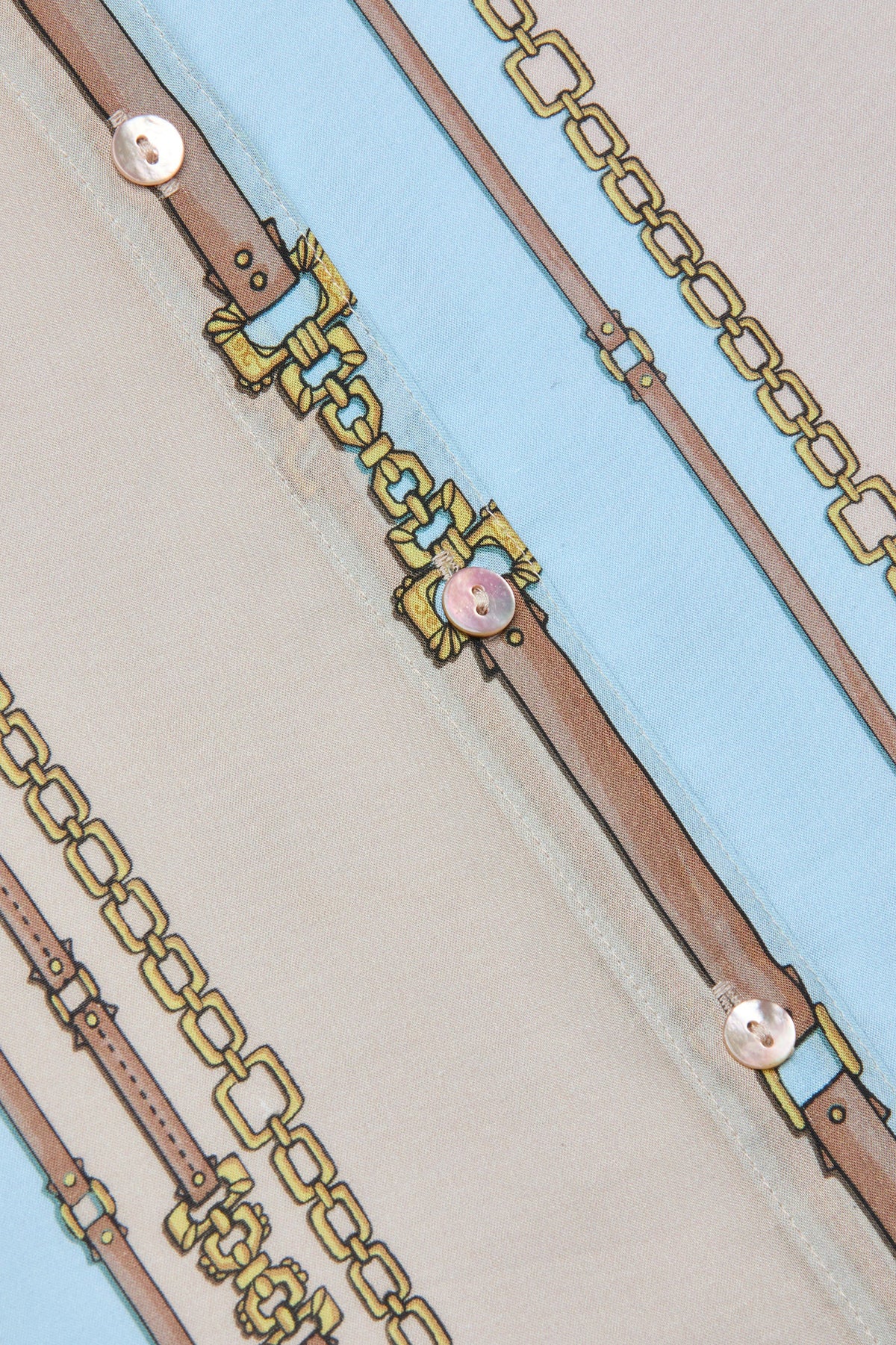 Three-quarter sleeve blouse with a soft stripe pattern.