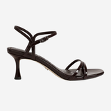A single dark brown strappy sandal with a kitten heel, shown from a side profile view against a light gray background.