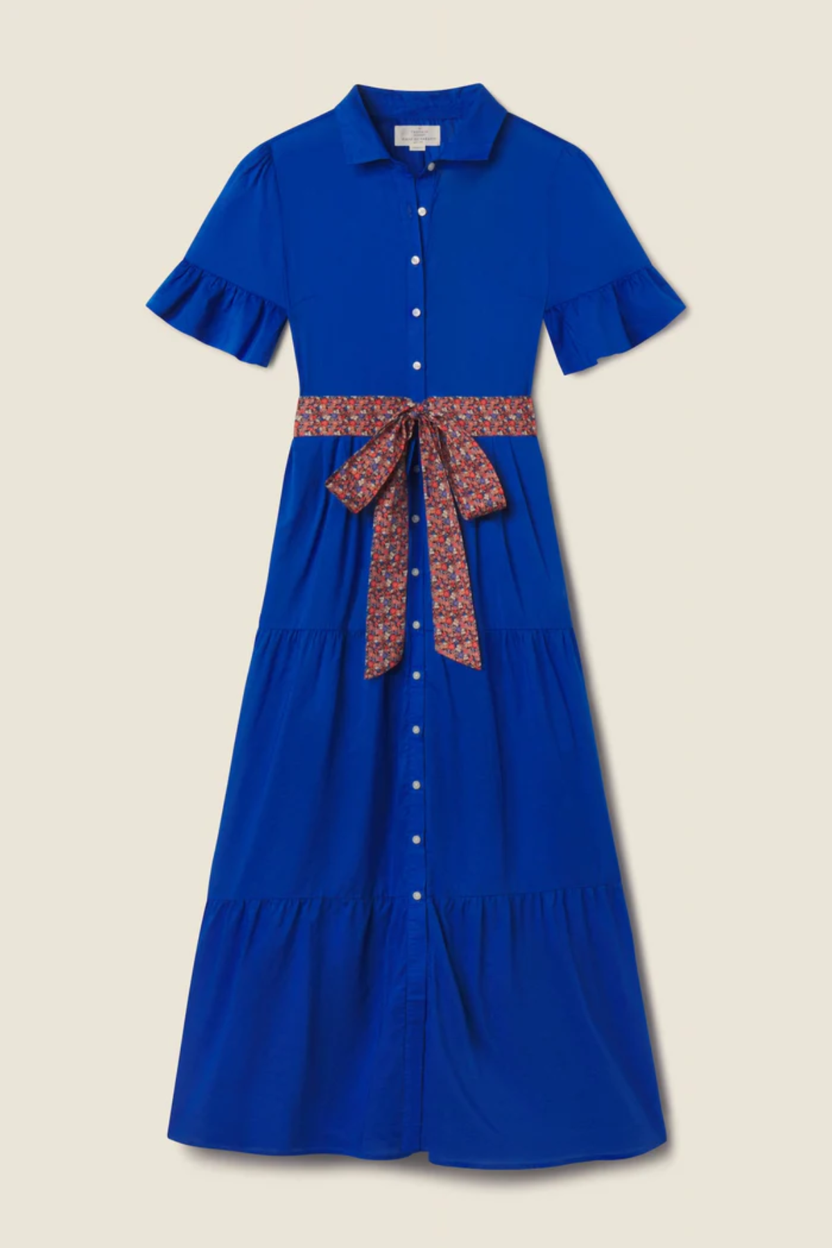 blue dress on tan background 