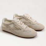 Pair of beige sneakers on a white background