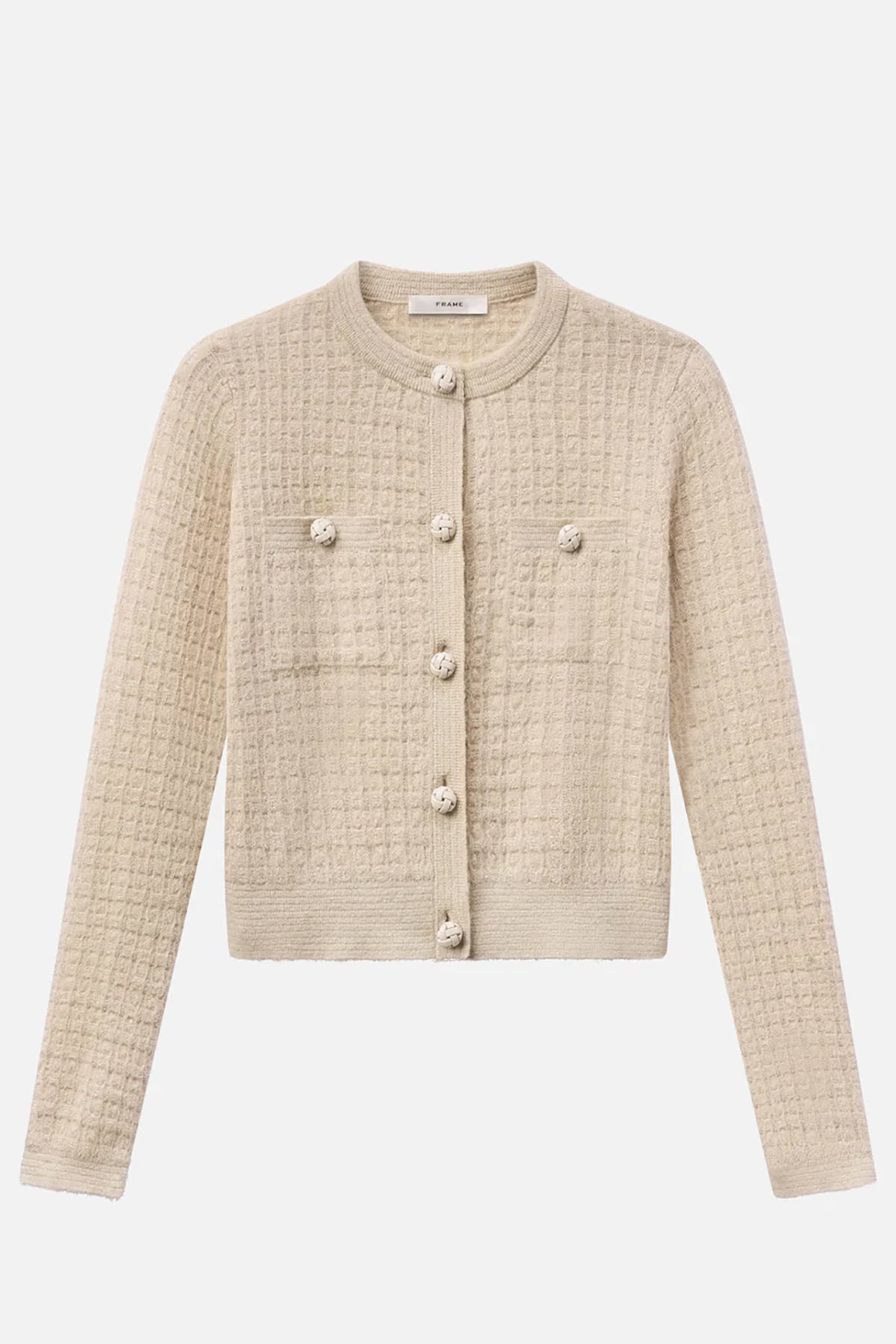 Check-pattern cardigan with subtle lurex shimmer, worn open over a neutral top