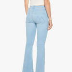 back of woman in blue denim and white tank top on white background 