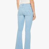 back of woman in blue denim and white tank top on white background 