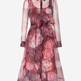 A sheer long-sleeve midi dress with a floral print in dusty pink, mauve, and burgundy tones, featuring a pointed collar, button front, and a matching self-tie belt at the waist.
