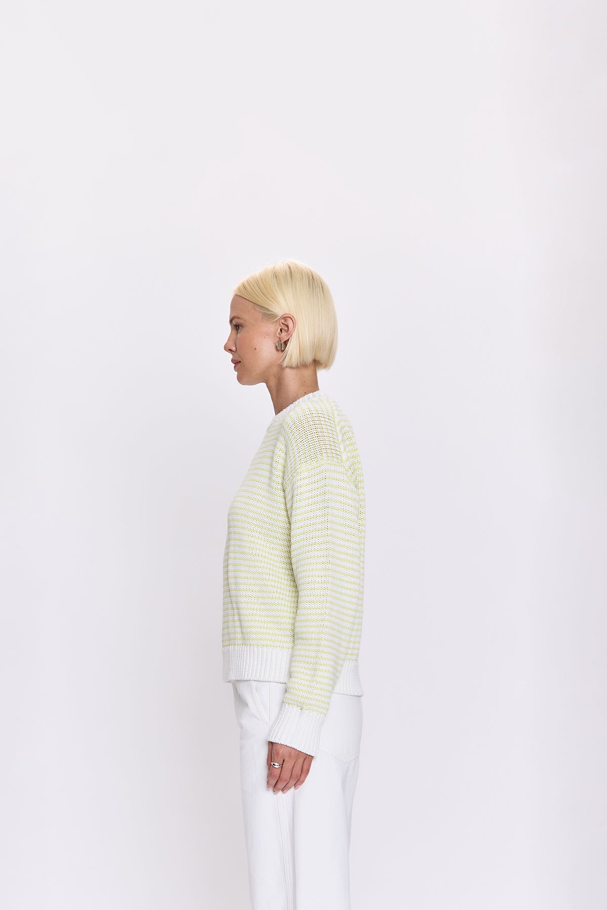 Lightweight knit stripe top with a relaxed, polished fit.