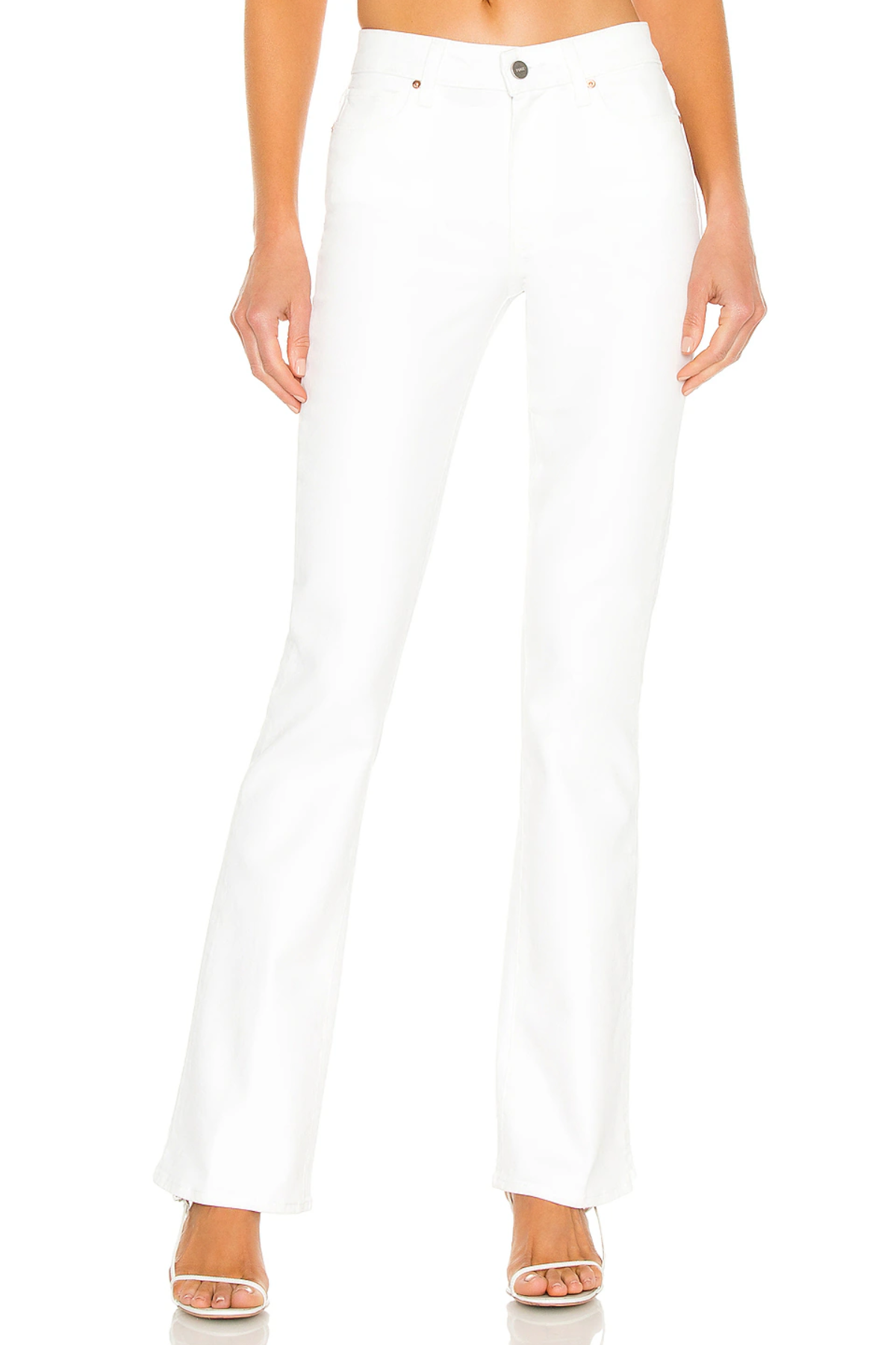 White jeans worn by a person on a white background