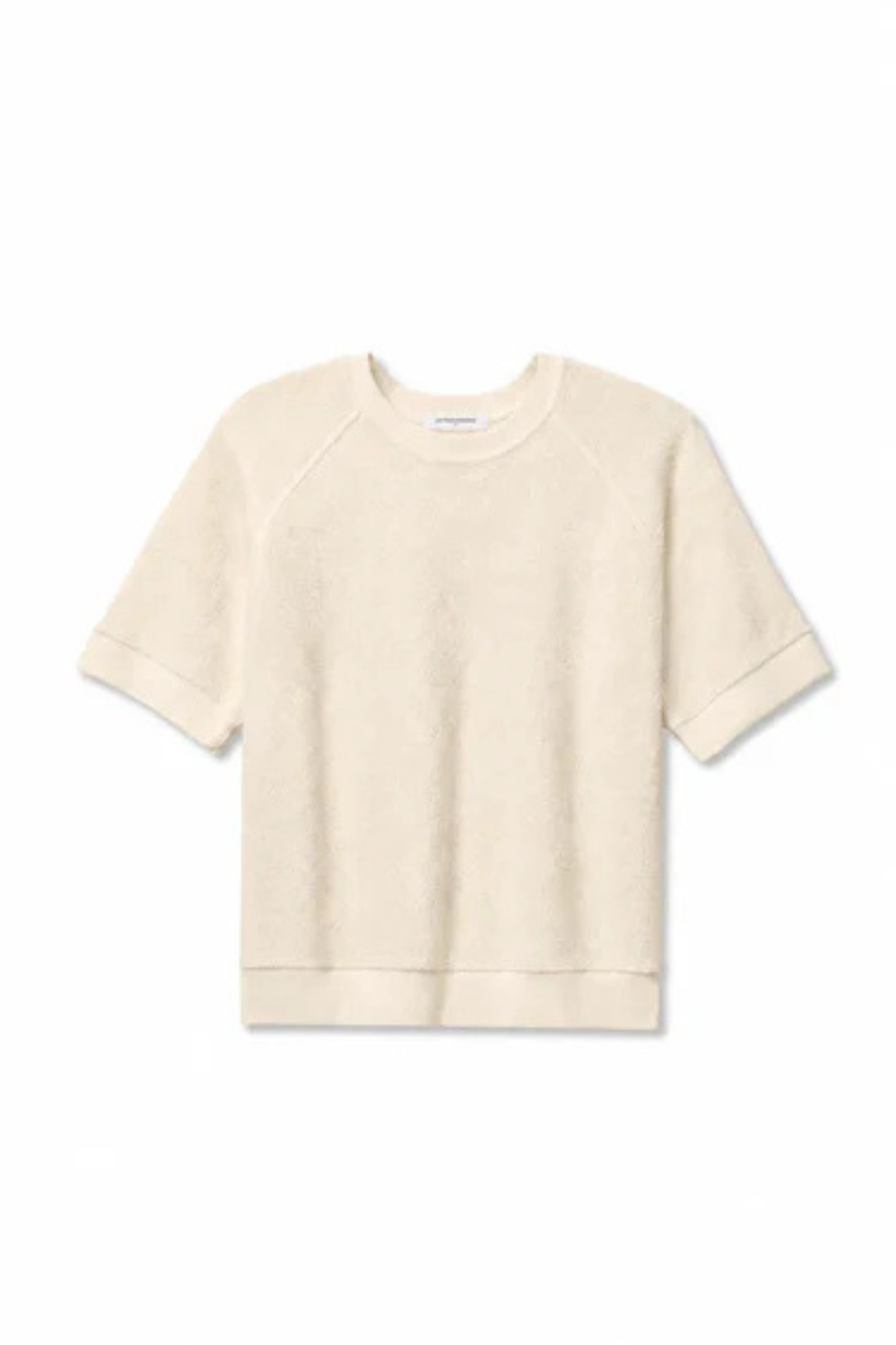A short-sleeve crewneck sweatshirt in a light cream or off-white color, displayed flat against a light gray background.