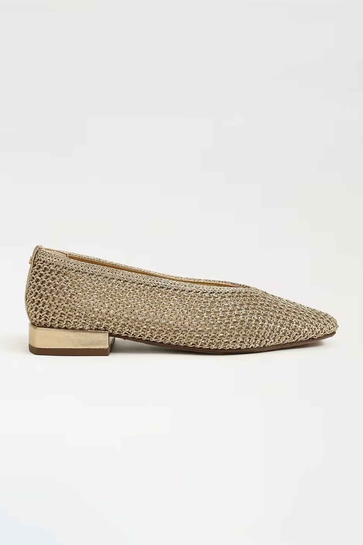 Beige woven flat shoe on a light gray background