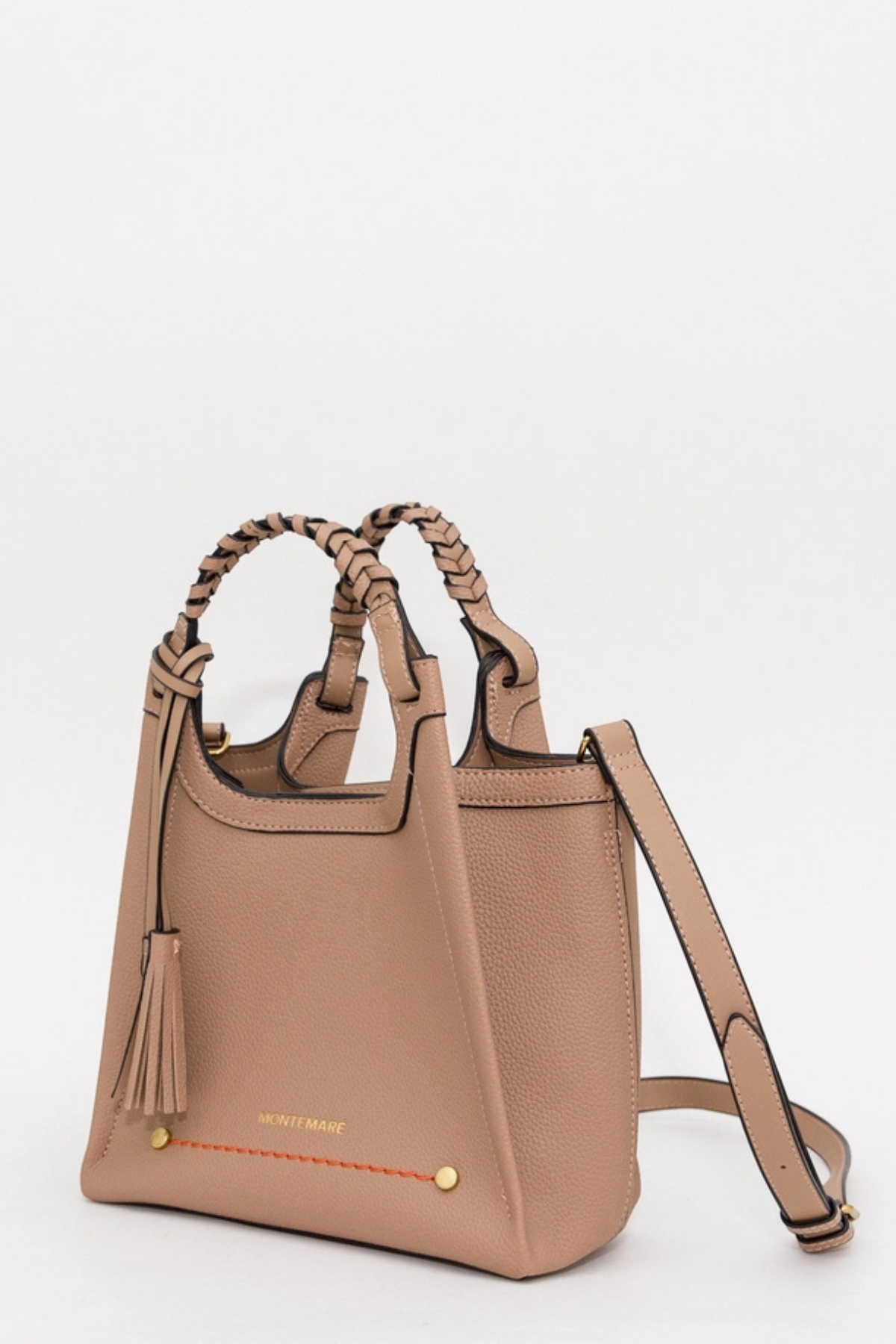 A structured tan leather handbag with braided top handles, a tassel detail, and a detachable shoulder strap, shown on a plain light background.