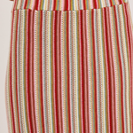 Multicolored striped skirt with a plain background