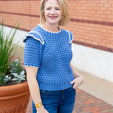 Short sleeve knit sweater with contrast embroidery detail