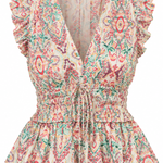 A sleeveless peplum top with ruffled cap sleeves, a deep V-neckline, and a gathered smocked waist, featuring an all-over paisley and floral pattern in pink, green, and blue on a light beige background.